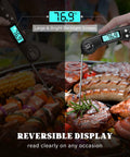 Pro Grade Instant Read Digital Meat Thermometer For Grilling And Cooking, 2-3 Second Temperature Check With 1 Degree Fahrenheit Accuracy, Perfect For Steak, BBQ, Smoking Brisket, Oven, And Slow Cooker. Black digital thermometer with backlit screen and probe over grill