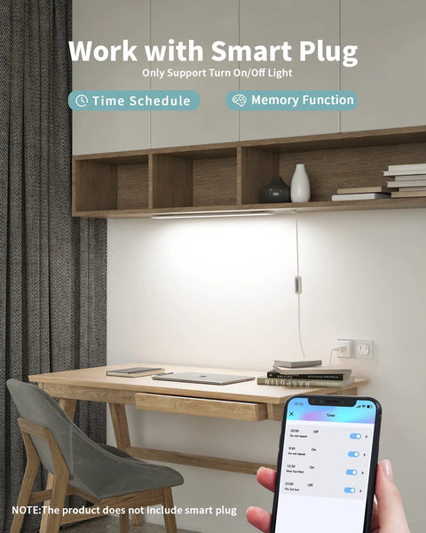 Modern desk setup with Go To Under Desk Light 16 Inch Dimmable LED Under Cabinet Lighting, smartphone displaying smart plug settings