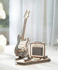 DIY Wooden Guitar Kit 3D Puzzle Craft Build Your Own Electric Guitar Model with mini amplifier on display