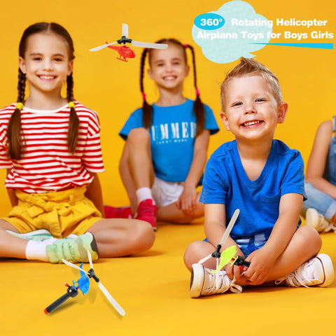Kids playing with Epic 12 Pack Handheld Flying Helicopters And Plastic Airplane Toys For Kids Outdoor Play Party Favors Classroom Prizes Birthday Gift Random Colors Great For Backyard Fun And Park Adventures.