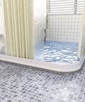 Heavy Duty 3 Inch Rise Shower Threshold Water Dam Adhesive Leak Blocker Guards Bathrooms slaps down at shower base keeping floors dry.