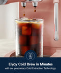 Close-up of glass with iced cold brew coffee under the Compact Espresso Machine And Cold Brew Coffee Maker With Automatic Milk Frother Wand For Next Level Hot Iced Coffee Crafts And Dope Daily Sips In Sleek Rose Pink.