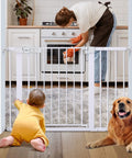 Adjustable 29.5 To 46 Inch Wide Baby Gate For Stairs And Doorways Extra Wide Auto Close Pet Gate in kitchen with baby and dog