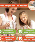 Mother and daughter baking with Stainless Steel Pastry Scraper Cutter Chopper With Measuring Scale visible in corner.