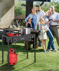 Two Burner Outdoor Propane Gas Stove With Adjustable Regulator 150,000 BTU High Pressure Stand Cooker in backyard setting