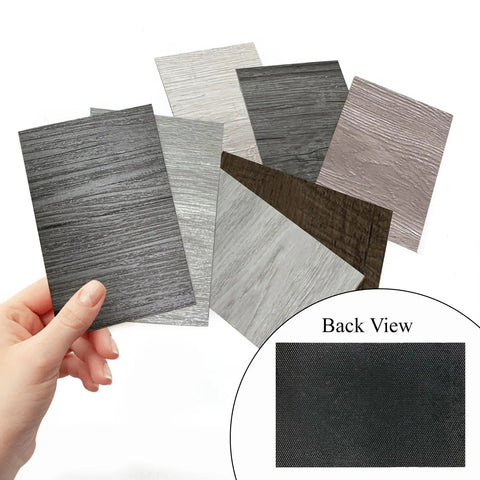 Various color samples of Self Adhesive Vinyl Floor Tiles Peel And Stick Planks in different wood grains with back view detail.