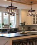 Farmhouse Rustic Chandelier With Antique Geometric Industrial Design In Bronze Four Light Hanging Fixture over kitchen island