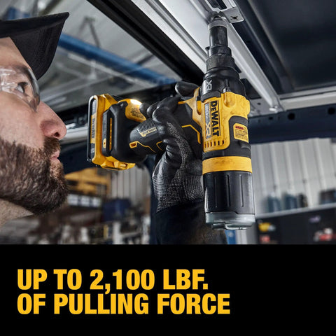 Person using 20V Max XR Cordless Rivet Tool Three Sixteenths Inch With Brushless Motor, 2100 Lbf Pulling Force