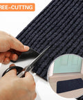 Close-up of trimming Large Semi Finished Striped Door Mat 30 By 48 Inch Waterproof Entry Rug with scissors; inset of mat on doorstep
