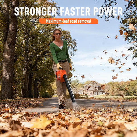 Person using Gas Powered Handheld Leaf Blower 28cc Two Stroke With 475 CFM 200 MPH Wind for clearing leaves on a road.