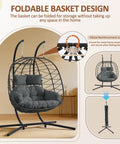 Double Egg Chair With Stand For Indoor And Outdoor Use, 2 Person Hanging Rattan Wicker Swing in dark gray with cushion and headrest.
