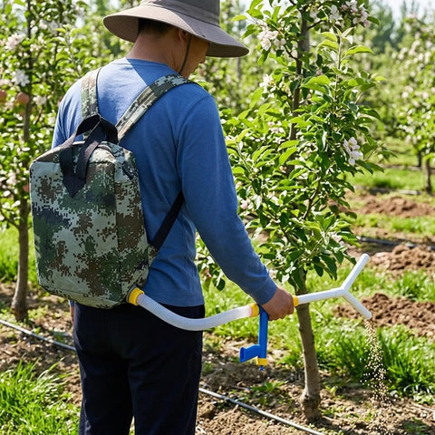 Person using Backpack Manual Spreader Dispenser For Farming 20L Capacity With Bag Easy Carry Durable PVC Construction in orchard