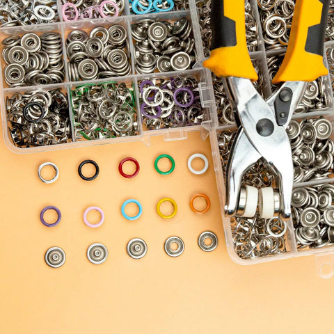 11mm Metal Snap Button Kit With Heavy Duty Press Tool Pliers 800 Pieces In 10 Colors DIY Clothes And Craft Friendly Snap Fasteners Set For Sewing Garments And Accessories displayed with colorful snaps and pliers.