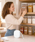 Gotta Love This Straight Up Compact Bluetooth Label Printer With Self Adhesive Tape Wireless Thermal Mini Label Maker in kitchen with labeled jars.