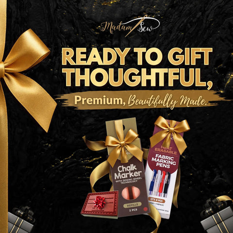 Gift packaging with chalk marker, fabric marking pens, wrapped with gold ribbons against black background with 'Ready to Gift' text.
