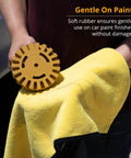 Person holding yellow 4 Inch Decal Remover Eraser Wheel For Cars And Boats Remove Stickers Adhesive Vinyl Pinstripes Glass Metal Emblems With Rubber Wheel And Drill Adapter near a cloth against car