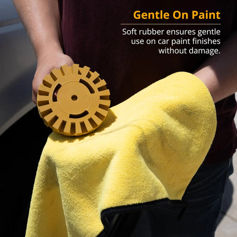 Person holding yellow 4 Inch Decal Remover Eraser Wheel For Cars And Boats Remove Stickers Adhesive Vinyl Pinstripes Glass Metal Emblems With Rubber Wheel And Drill Adapter near a cloth against car