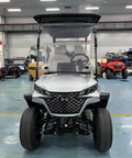 Full Size Four Plus Two Seater Electric Golf Cart White featuring Macpherson Strut Independent Suspension in showroom.