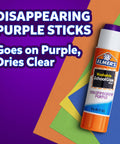 Disappearing Purple School Glue Sticks 3 Pack 22g Each Washable Dries Clear, shown with colorful paper background