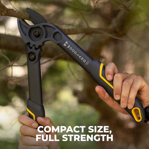 Compact 16 Inch Lopper With Gear Assist Anvil Blade lightweight pruner in use, cutting dry branch; glass-filled nylon handles
