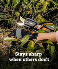 20V Nitro Pruning Shear And Lopper WG330 Cordless With Titanium Plated Blade in use on green shrub branch