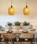 2 Pack Battery Operated Handwoven Natural Rattan Chandeliers Egg Shaped Boho Pendant Lights above dining table with greenery