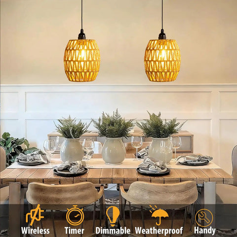 2 Pack Battery Operated Handwoven Natural Rattan Chandeliers Egg Shaped Boho Pendant Lights above dining table with greenery