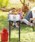 Beast 200000 BTU Propane Burner Outdoor Stove With High Pressure Output and pot at a campsite.
