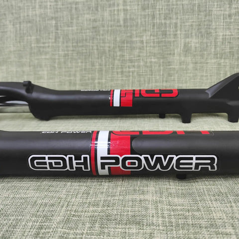 Close-up of Beefy 26 Inch Fat Bike Fork 4.0 Suspension With 1 1 8 Headset, aluminum alloy material with branding on a textured surface