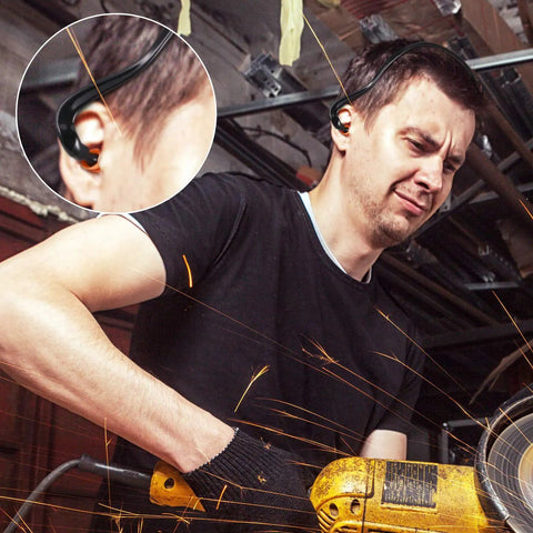 Man wearing banded earplugs for shooting range with silicone band, lightweight hearing protection in construction setting