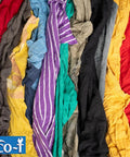 Industrial Mechanic Shop Rags Four Pound Bag Made From 100 Percent Recycled Colored T Shirt Material in mixed colors.