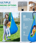 Kids Pod Swing Seat Cotton Hammock Chair for Indoor and Outdoor Play Blue Sensory Swing in use outdoors with children.