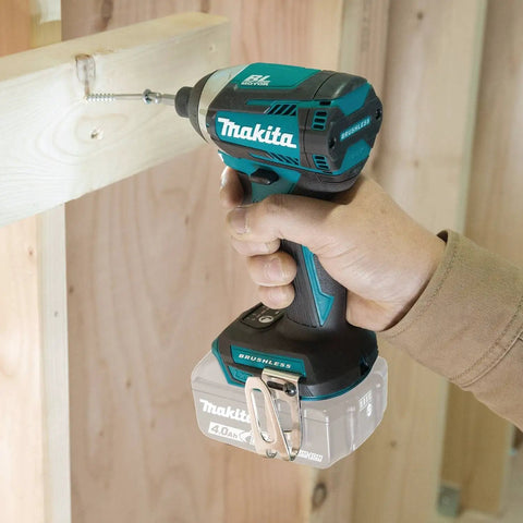 Person using 18V LXT Brushless Cordless Impact Driver with Quick-Shift Mode on wood construction