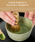 Person using Pink Matcha Whisk Set With Chasen Holder And Ceramic Stand Includes Bamboo Scoop Fine Mesh Sifter And Tea Tools For Ceremony Gift For Home Barista Vibes And Everyday Froth, whisking matcha in a green bowl.