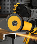 Worker using 5/8-11 Inch Angle Grinder Flange Nut Set - 2 Pack Quick Release Locking Nuts on yellow grinder cutting metal