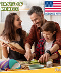 Family cooking in kitchen with Multicolor 12 Inch Tortilla Warmer Pouch on table, microwavable fabric tortilla heater visible.