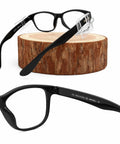 Heavy Duty Photochromic Safety Glasses With ANSI Z87 Approval, light adapting lenses, showing side view against a wooden background.