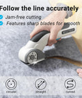 Cordless Electric Scissors Heavy Duty Fabric Cutter Lightweight Power Shears cutting through fabric with sharp blades.
