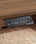 Control panel of Cool L Shaped Electric Standing Desk With Brown And Black Finish, featuring height adjustment options.