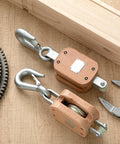 Two Pack Four Inch Wood Manila Rope Pulley Block With Hook Single Wheel Cable Pulley Half Inch Rope Two And A Quarter Inch Sheave 1000 Lbs WLL for light industrial use.
