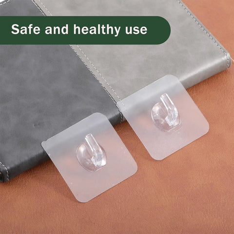 Clear Adhesive Hooks Zero Drama Strong Grip for Shower Wall Organizers No Damage Pegs Bathroom Storage 12 Pieces Nifty Transparent Holder on surface.