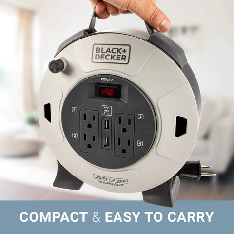 Close-up of 25 Ft Retractable Extension Cord Reel With 4 Outlets, 2 USB Ports, ergonomic handle, in hand