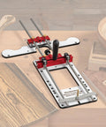 Solid Multi Function Router Base Built With Tough Three Eighth Inch Guide Rods For Dead On Edge Guidance on wood surface