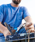 Person using 9.5 Inch Wire Crimping Tool For Insulated And Non Insulated Terminals With Center Cut Pliers outdoors on wiring project