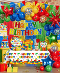 Complete Building Block Birthday Bash Decor Kit In One Box With Foil Balloons, colorful balloons, bunting, and birthday table setup.