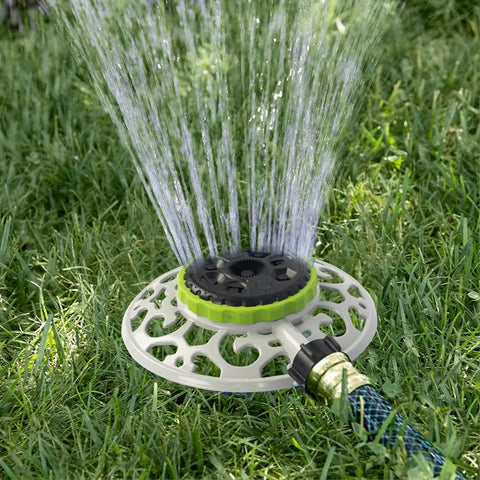 Adjustable Turret Metal Sprinkler with 8 Modes in use on lawn, rust-resistant aluminum alloy base, hose connected