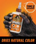 A hand holding wood glue bottle with Type II watermark; focuses on Natural Wood Color Wood Glue, 4 Ounce Bottle Pack of 2 - Water Resistant Bond for Indoor Outdoor Projects, Quick 20 to 30 Minute Clamp Time, Fully Cures in 24 Hours, Your Go-To Glue for DIY Repairs and Craft Projects.