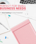Light Pink 8.5 By 12 Inch Bubble Mailers Self Seal Padded Envelopes Air Cushioned Waterproof Lightweight Shipping Bags Usable 8.5 By 11 Space Pack Of 100 For Easy Hassle Free Shipments shown with stationery.