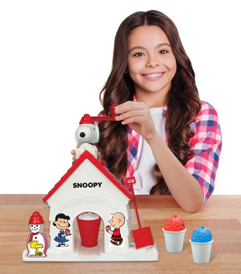 Child using Snoopy House Snow Cone Machine For Kids Hand Crank Shaved Ice Maker With Fruit Punch Flavor Pack Easy Setup Summer Cooling Toy.