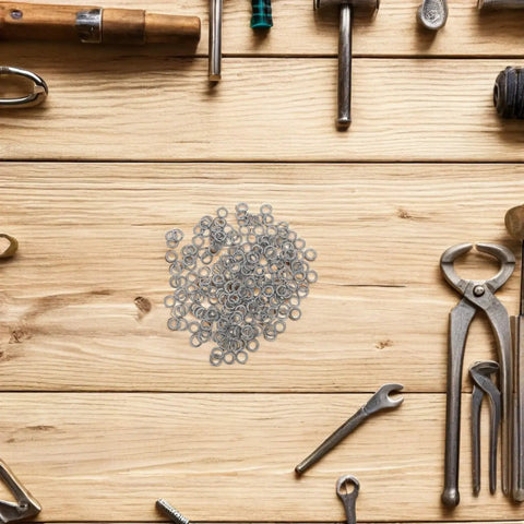 Stainless Steel Spring Lock Washers And Circular Flat Washers Set 200 Pieces with tools on wooden table
